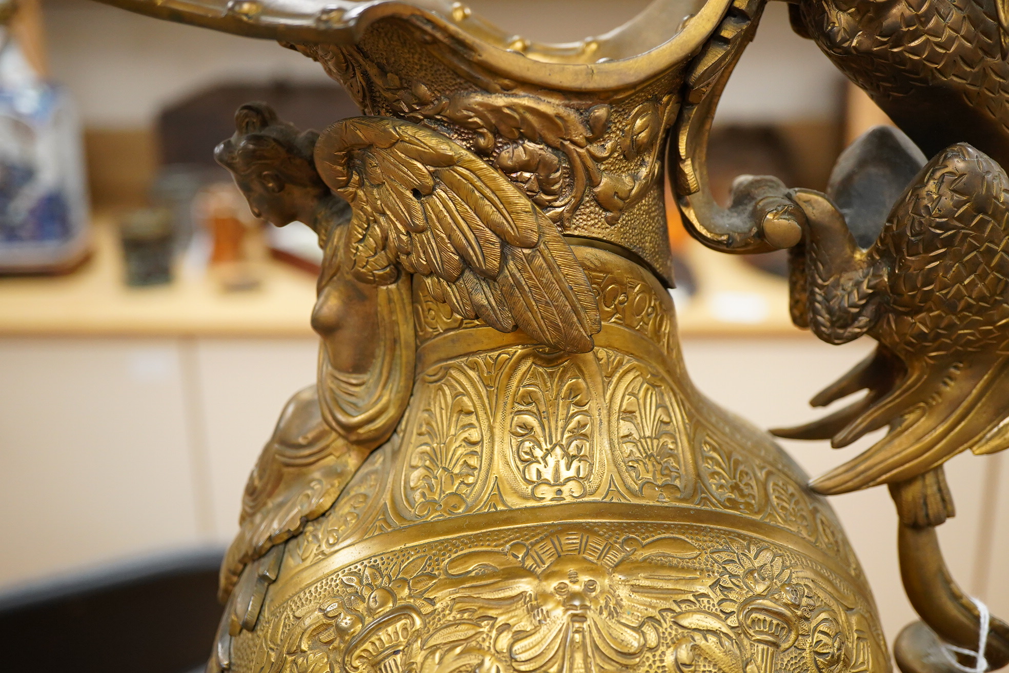A late 19th century Renaissance-style ewer with dragon handle, 65cm high